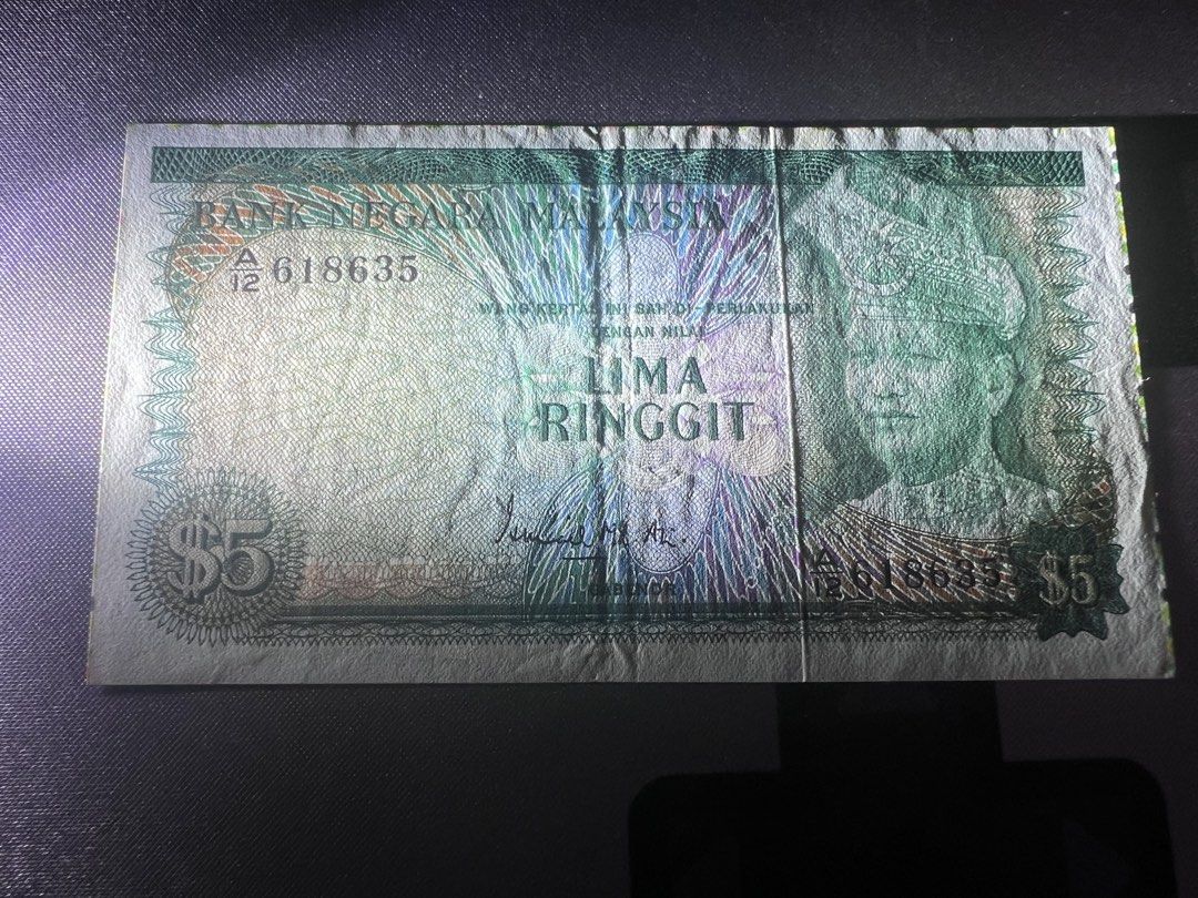 Error note RM5 (Category: Currency) located in Puchong. Submitted by thomasgadgethouse (Listing ID 1443007099, Image 1). Description: This is different from others, seems like man made error or something else. .