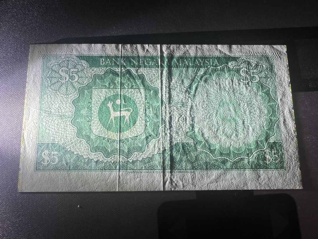 Error note RM5 (Category: Currency) located in Puchong. Submitted by thomasgadgethouse (Listing ID 1443007099, Image 2). Description: This is different from others, seems like man made error or something else. .
