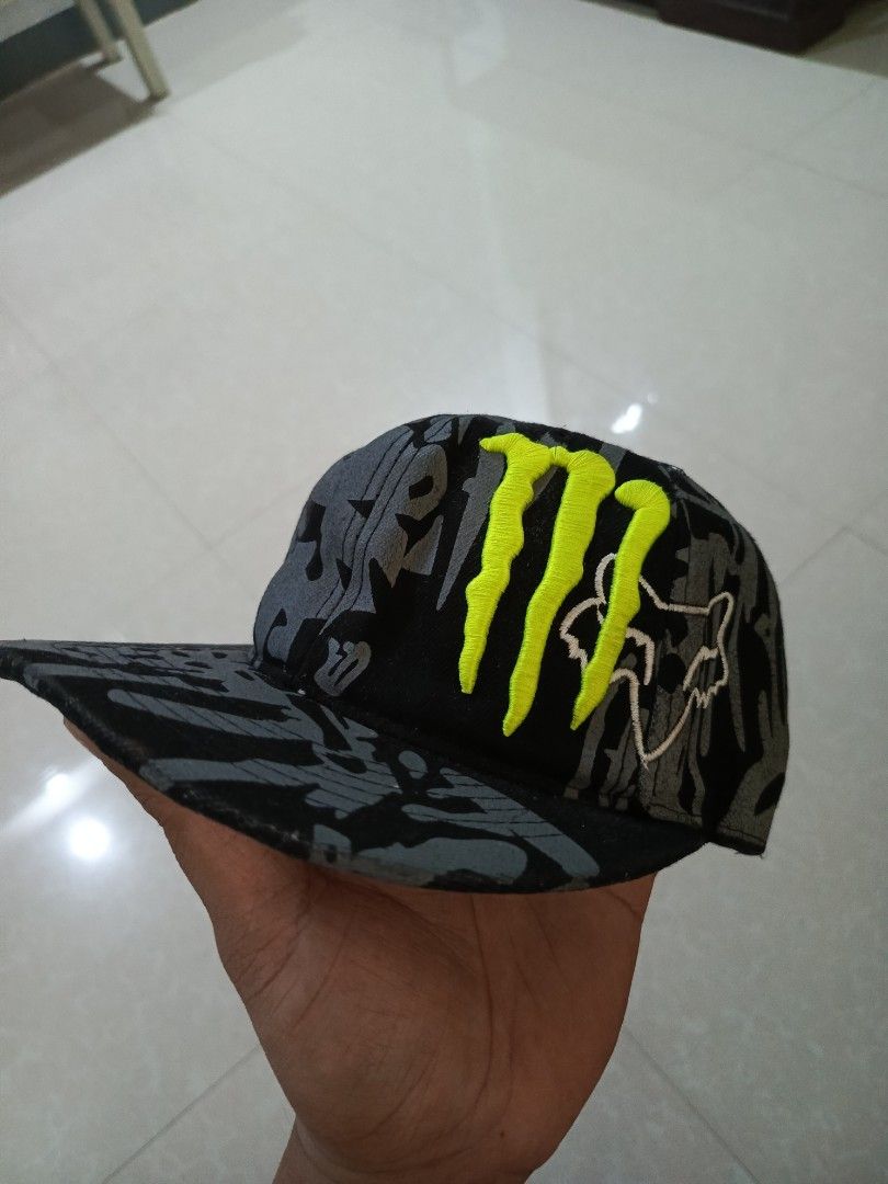 Monster Energy Fox Racing Snapback Cap (Category: Caps & Hats) located in Cabatuan. Submitted by penthegreat (Listing ID 1443002233, Image 3). Description: -for collectors, used not brandnew - Monster Energy x Fox Racing collaboration cap - Stylish grey and black camouflage pattern - Bold neon green Monster logo on the front - Classic flat brim design - Adjustable snapback closure for a perfect fit - Ideal for motocross and energy drink enthusias