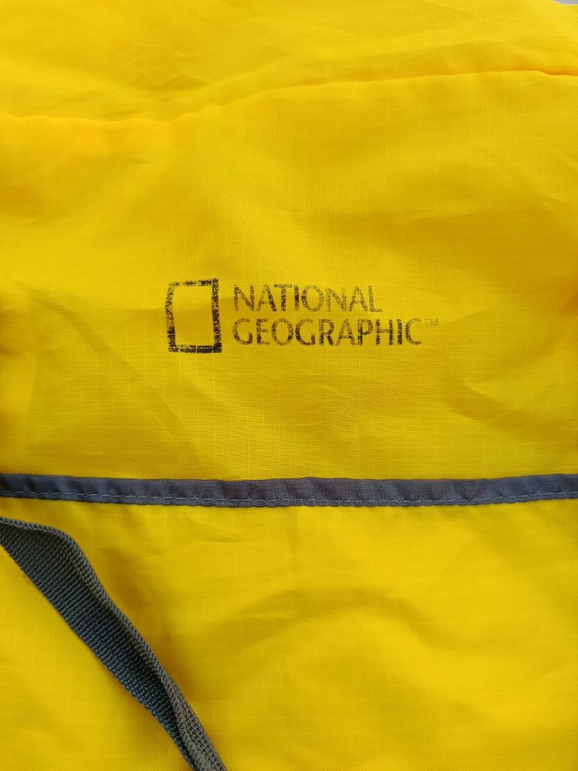National Geographic Yellow Duffel Bag (Category: Backpacks) located in Jasaan. Submitted by eliwhomp (Listing ID 1443048624, Image 2). Description: - Vibrant yellow duffel bag with stylish grey accents. - Features the iconic National Geographic logo. - Equipped with two comfortable carry handles. - Folds compactly for convenient storage when not in use. - Ideal size for weekend getaways or gym sessions..
