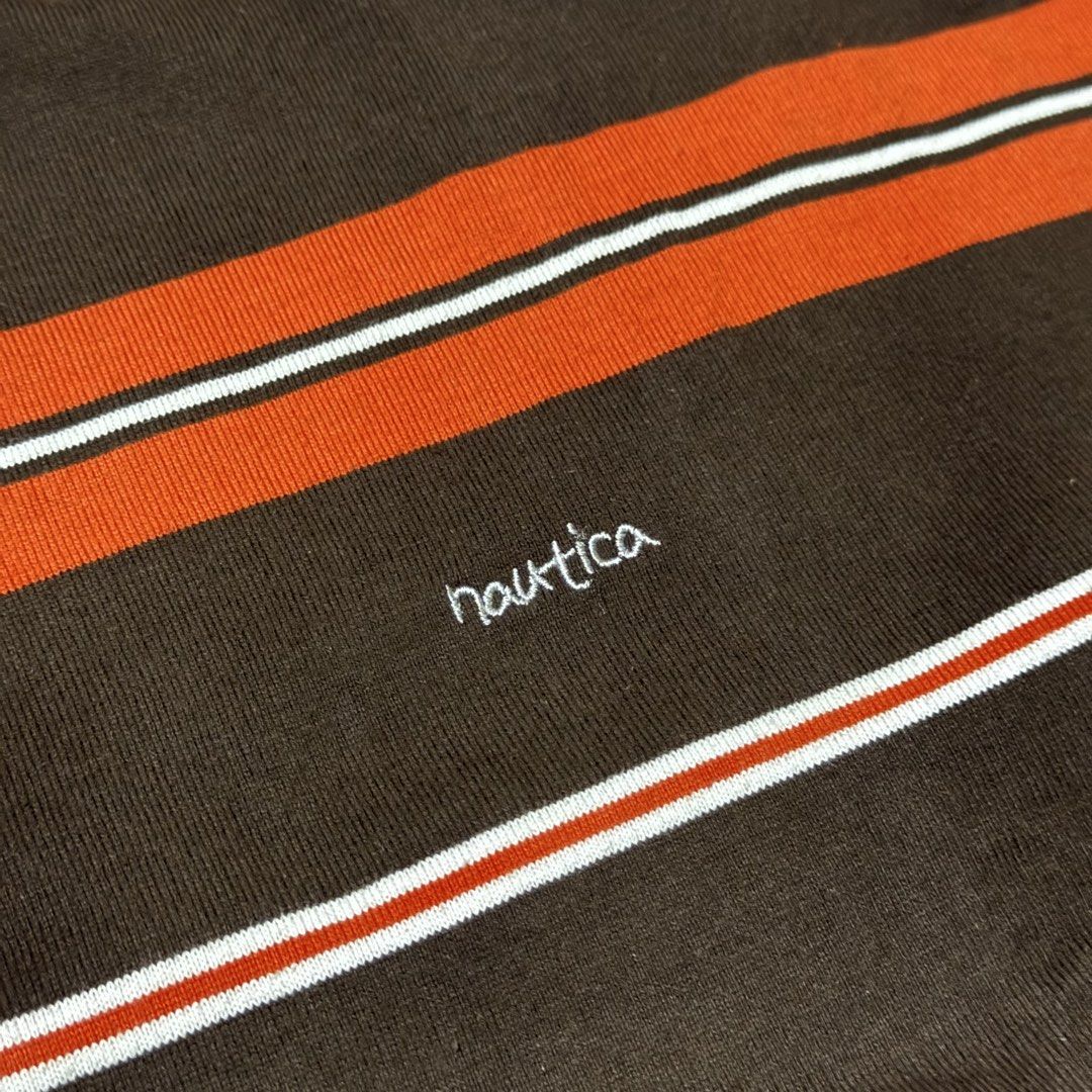 Nautica Vintage Collection Striped Tee (Category: Tshirts & Polo Shirts ) located in Paranaque City. Submitted by passiveaggressif (Listing ID 1443071865, Image 2). Description: - Vintage Nautica T-Shirt - Size: Medium (M) - Color: Brown with Orange & White Stripes - Material: Cotton & Polyester Blend - Branding: Nautica logo on chest - Collection: 'Vintage Collection' tag - Dims: Width: 24” Length: 31”.