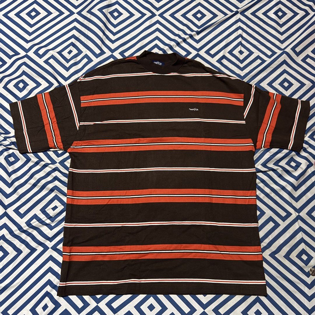Nautica Vintage Collection Striped Tee (Category: Tshirts & Polo Shirts ) located in Paranaque City. Submitted by passiveaggressif (Listing ID 1443071865, Image 1). Description: - Vintage Nautica T-Shirt - Size: Medium (M) - Color: Brown with Orange & White Stripes - Material: Cotton & Polyester Blend - Branding: Nautica logo on chest - Collection: 'Vintage Collection' tag - Dims: Width: 24” Length: 31”.
