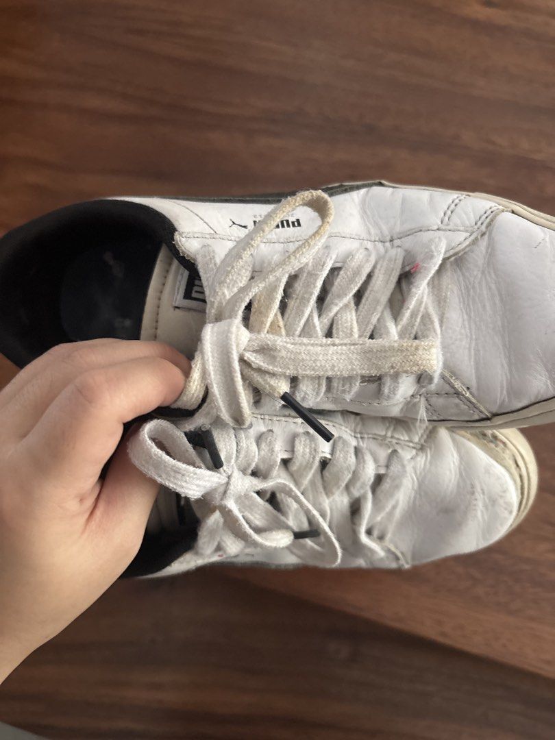 Negotiable BTS First Generation Puma White Leather Sneakers (Category: Sneakers) located in Paranaque City. Submitted by gabfera (Listing ID 1442961995, Image 3). Description: - Classic white Puma low-top sneakers - Genuine leather upper - Shows some signs of wear on soles and uppers - Laces are a bit dirty - Plenty of life left for casual wear.