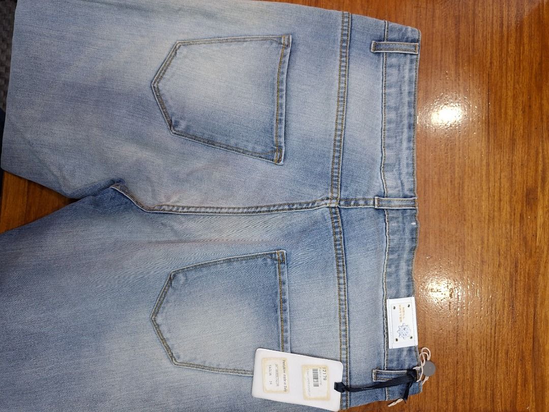 NEILL KATTER Light Wash Denim Jeans (Category: Jeans) located in Tuguegarao City. Submitted by seagull2026 (Listing ID 1442951390, Image 3). Description: - Light wash denim jeans by NEILL KATTER - Distressed look with front rips - Button fly closure - Classic five-pocket styling - Made in Italy - Ideal for casual wear - Like new (with original tag) - waist 34 inches.