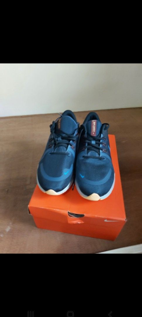 Nike Quest 4 size 13 US (Category: Sneakers) located in Pasig City. Submitted by borjong (Listing ID 1443025976, Image 2). Description: - Blue Nike running shoes - Breathable mesh upper - Durable rubber outsole for excellent traction - Secure lace-up closure - Ideal for running and everyday wear - Comes with original box.