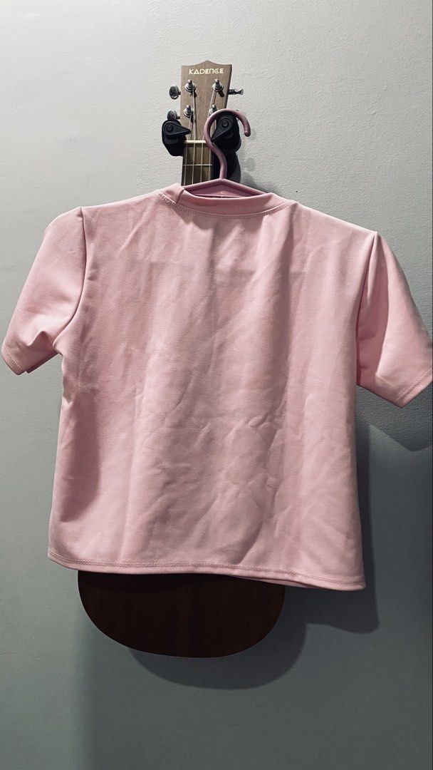 Pink T-shirt with Panda Patch (Category: Shirts) located in Quezon City. Submitted by smithram (Listing ID 1443020968, Image 2). Description: - Adorable pink t-shirt - Features a cute panda patch on the chest - Short sleeves for comfort - Classic crew neck design - Ideal for everyday casual wear - Easily pairs with jeans, shorts, or skirts.
