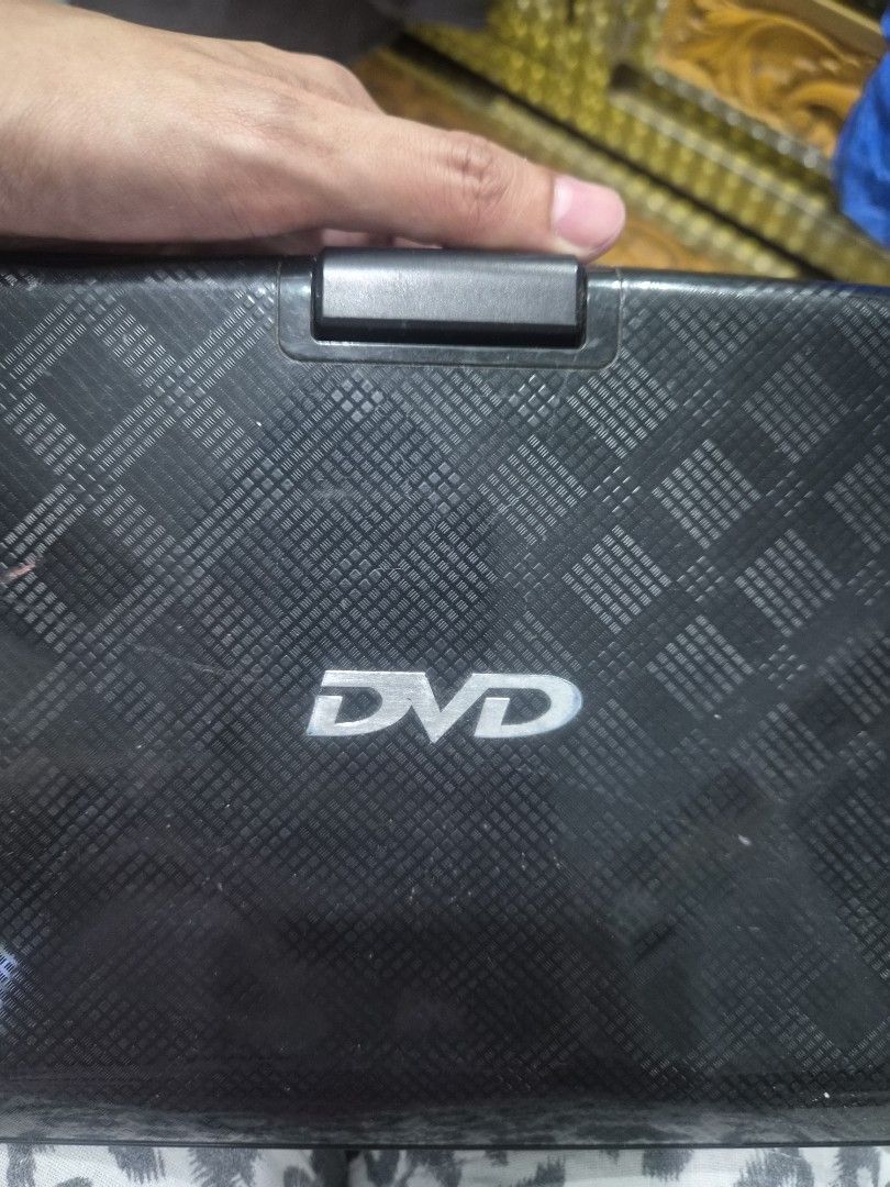 Portable dvd player (Category: Portable Music Players) located in Lucena. Submitted by jean.marian (Listing ID 1443003296, Image 3). Description: still looking for the charger. will update the list if nahanap ko na just to be sure that the item is still working.