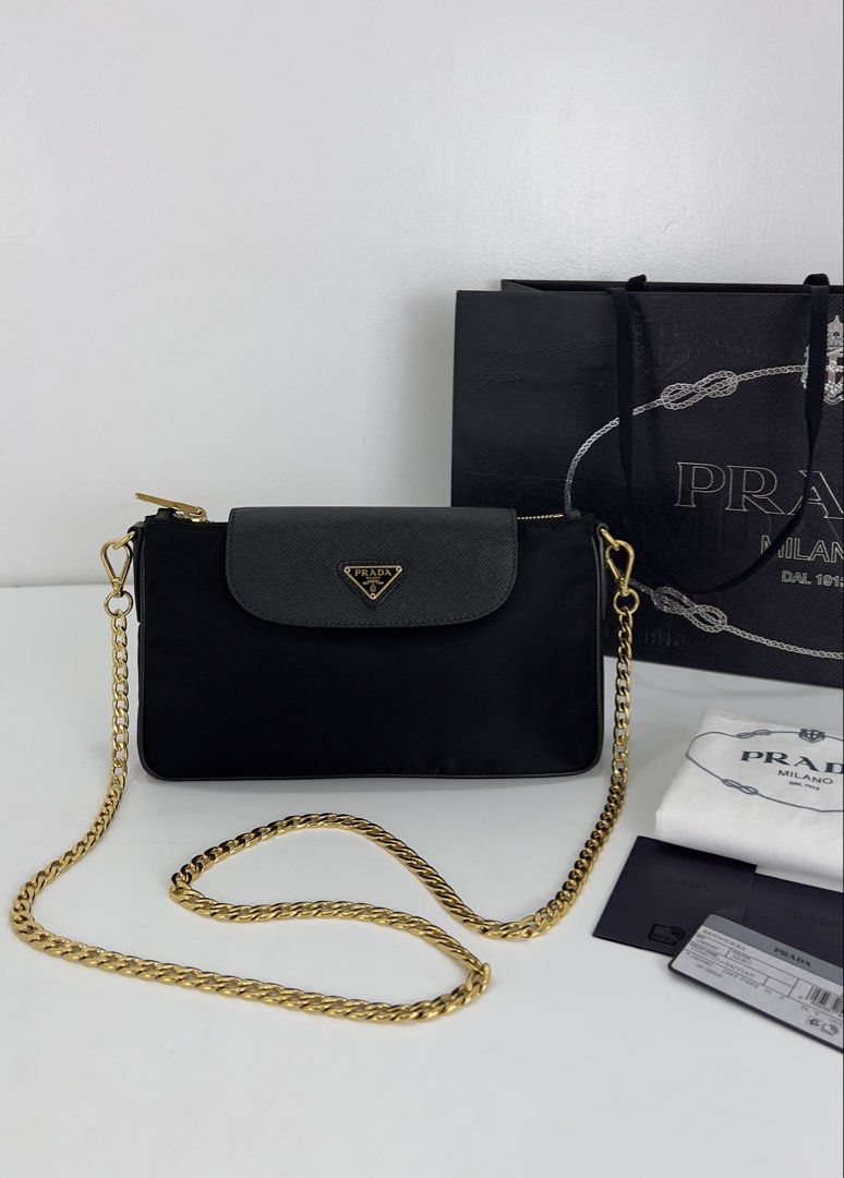 Prada Black Tessuto Nylon Saffiano Chain (Category: Luxury Bags & Wallets) located in Manila. Submitted by luxuryprelovedbagsby_by_agnes (Listing ID 1443071916, Image 1). Description: 95,000 SRP LIKE NEW CONDITION RFID / LATEST VERSION DIMENSIONS: 24.5cm x 14cm x5cm.
