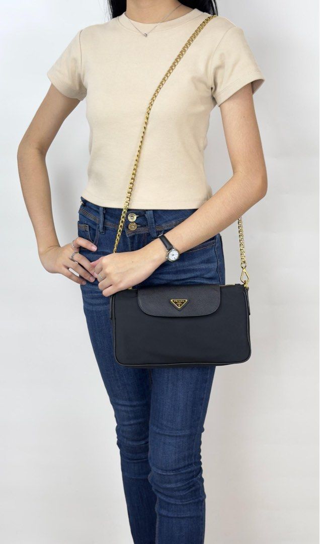 Prada Black Tessuto Nylon Saffiano Chain (Category: Luxury Bags & Wallets) located in Manila. Submitted by luxuryprelovedbagsby_by_agnes (Listing ID 1443071916, Image 2). Description: 95,000 SRP LIKE NEW CONDITION RFID / LATEST VERSION DIMENSIONS: 24.5cm x 14cm x5cm.
