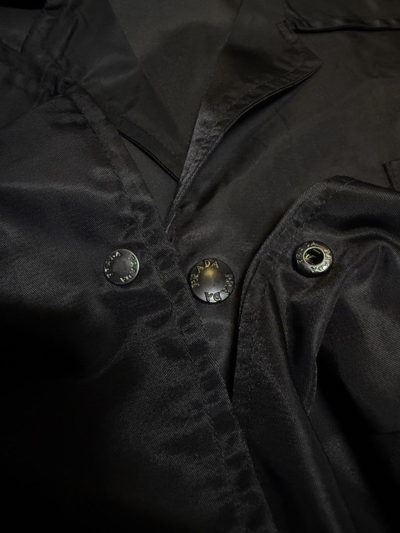Prada ReNylon Shirt Jacket (Category: Luxury Apparel) located in Manila. Submitted by tindero-ng-damit (Listing ID 1443037049, Image 3). Description: Prada Emblem Pocket Re-Nylon Shirt Jacket Snap Buttons Prada Hardware Size M - 24 x 29 Excellent Condition - Flawless Issues: None - needs to steam or flat iron DM.