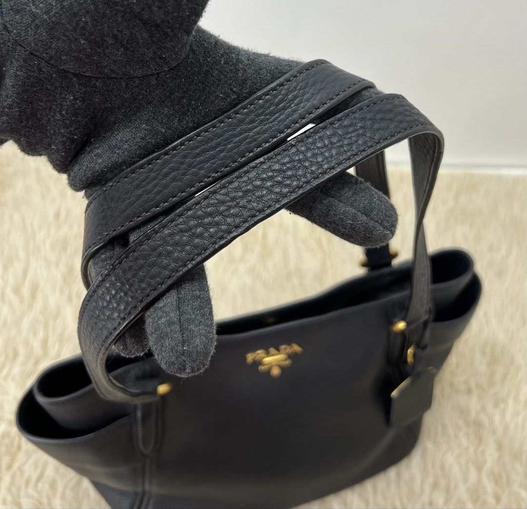 Prada Vitello Daino Leather Shoulder Bag (Category: Luxury Bags & Wallets) located in Manila. Submitted by luxuryprelovedbagsby_by_agnes (Listing ID 1443071226, Image 3). Description: Excellent Condition Dimensions: L 27cm x H 24cm x W 13cm.