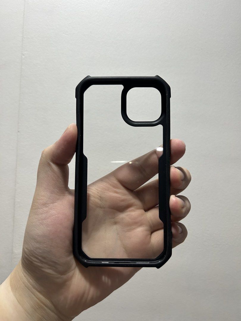 Protective Case for iPhone 12/13/14 (Black) (Category: Cases & Sleeves) located in San Juan City. Submitted by kera.g815 (Listing ID 1442960360, Image 2). Description: Product Details: Compatibility: iPhone 12/13/14 Color: Stealth Black Description: Selling an authentic protective iPhone Case in a sleek, minimalist black finish. The back features a gorgeous, understated textured leather finish that provides an excellent grip and resists fingerpri