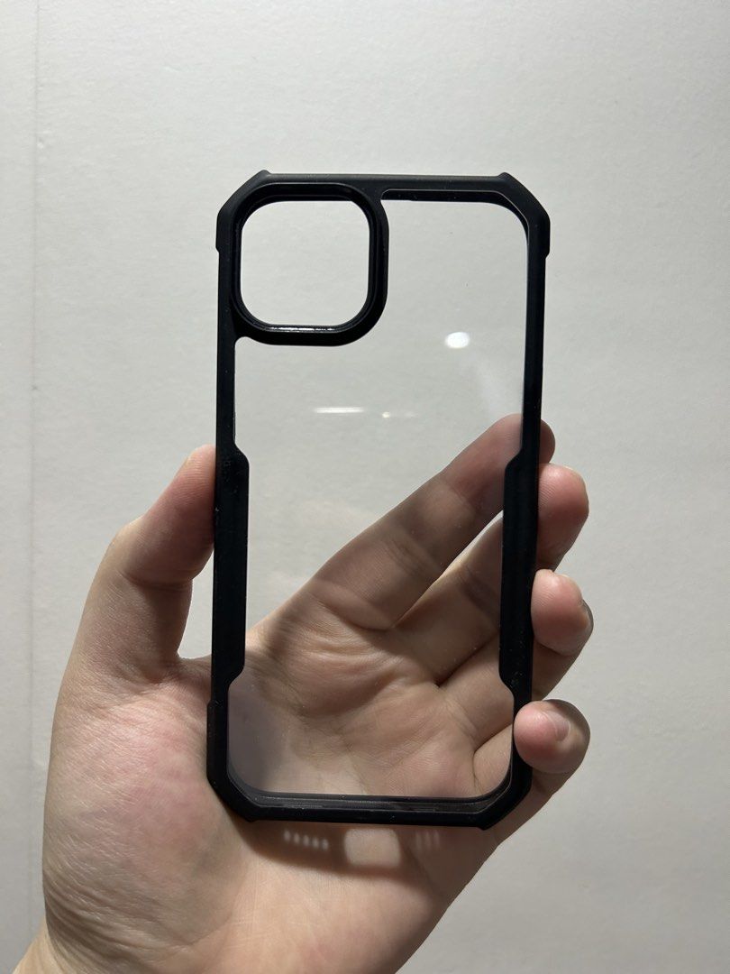 Protective Case for iPhone 12/13/14 (Black) (Category: Cases & Sleeves) located in San Juan City. Submitted by kera.g815 (Listing ID 1442960360, Image 3). Description: Product Details: Compatibility: iPhone 12/13/14 Color: Stealth Black Description: Selling an authentic protective iPhone Case in a sleek, minimalist black finish. The back features a gorgeous, understated textured leather finish that provides an excellent grip and resists fingerpri