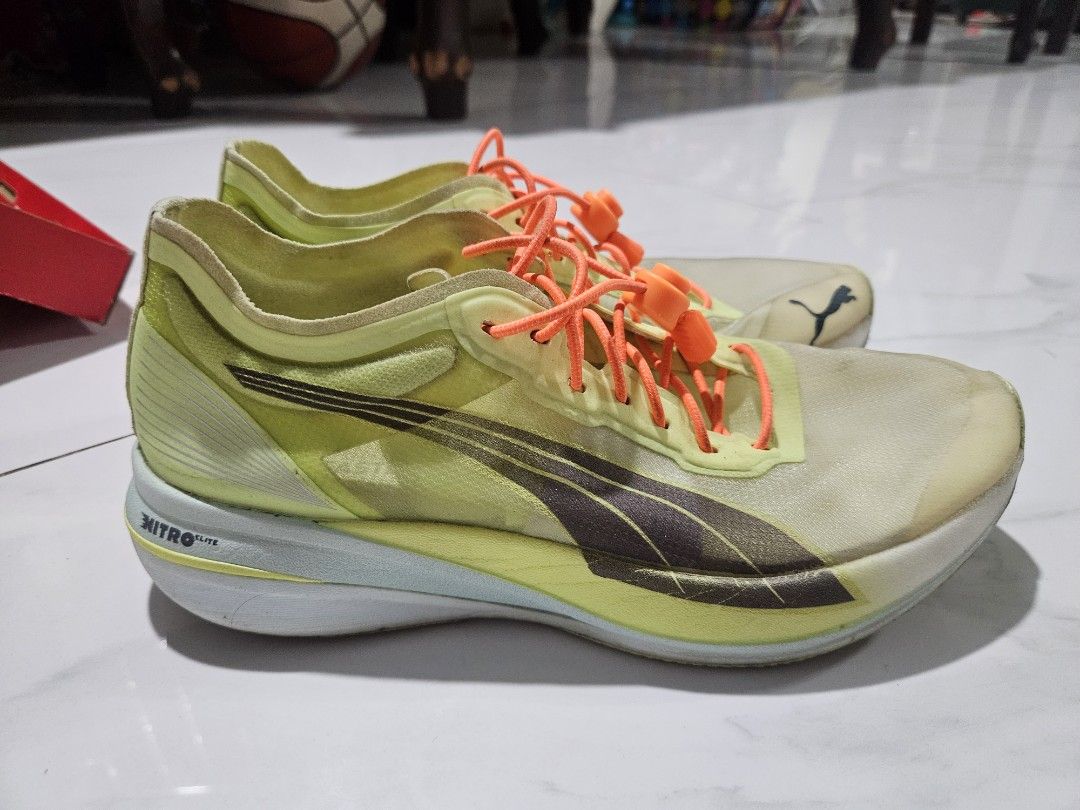 Puma Deviate Nitro Elite (Category: Sneakers) located in Mandaluyong City. Submitted by prelovednotunloved16 (Listing ID 1443022166, Image 2). Description: Puma Deviate Nitro Elite (Needs cleaning) Size: 9.5 US womens or 26cm Mileage: 155km Perfect for speed training (Used this for speed and race lang) Changed the shoe lace with no-tie lace, but original shoe lace is still clean and included in the box. RFS: Upgrading Last price posted!.
