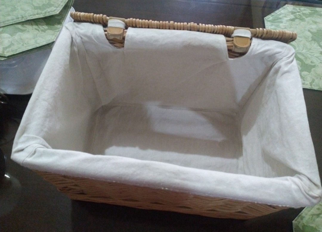 Rattan Storage Basket (Category: Storage Boxes & Baskets) located in Bulacan. Submitted by mitchikoscollection (Listing ID 1442941712, Image 2). Description: 🩷‼️Courier Lalamove only‼️1K above J&T‼️🩷 - Vintage Thick Rattan - Woven wicker basket with a hinged lid - Includes a fabric liner with delicate lace trim - Ties secure the liner in place - Ideal for storage, organization, or decorative purposes.