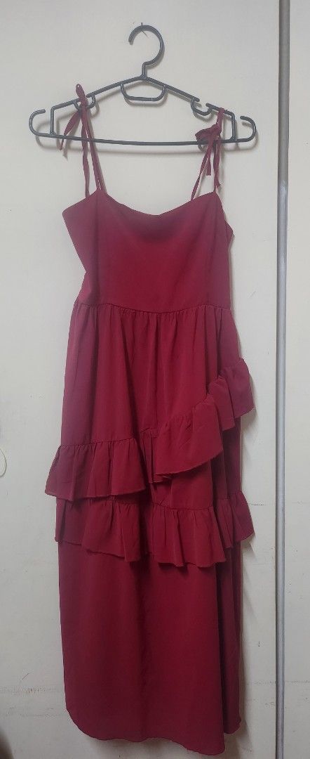 Red Tiered Ruffle Halter Neck Dress (Category: Dresses) located in Manila. Submitted by maybelle00 (Listing ID 1442931580, Image 1). Description: - Red halter neck dress - Features tiered ruffles down the front - Straps tie at the back - Estimated size: Small to Medium (S/M) - Ideal for parties or a night out.