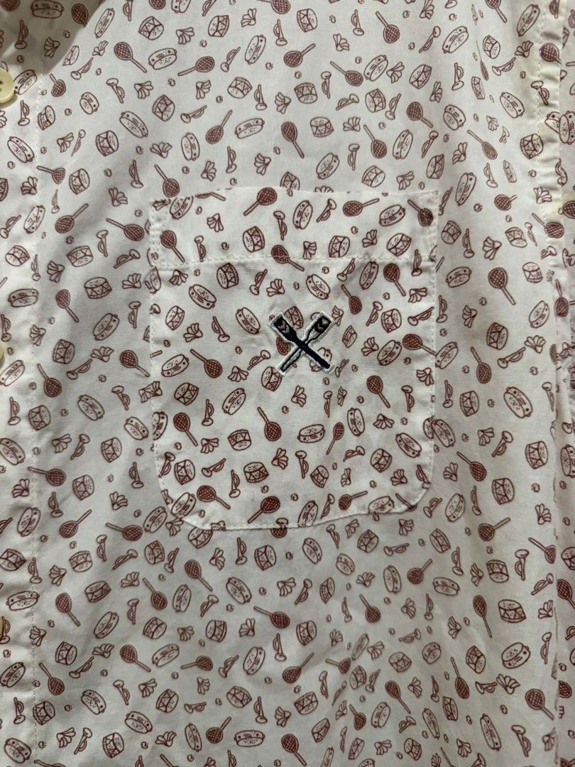 Regatta Short Sleeve Button Up Shirt Size M (Category: Shirts) located in Taguig. Submitted by geestuff27 (Listing ID 1443122196, Image 2). Description: - Brand: Regatta - Type: Short Sleeve Shirt - Color: Cream base - Print: Fun all-over musical instruments and candy - Features: Chest pocket with Regatta logo, button-up front - Size: Medium (M) - Occasion: Casual wear.