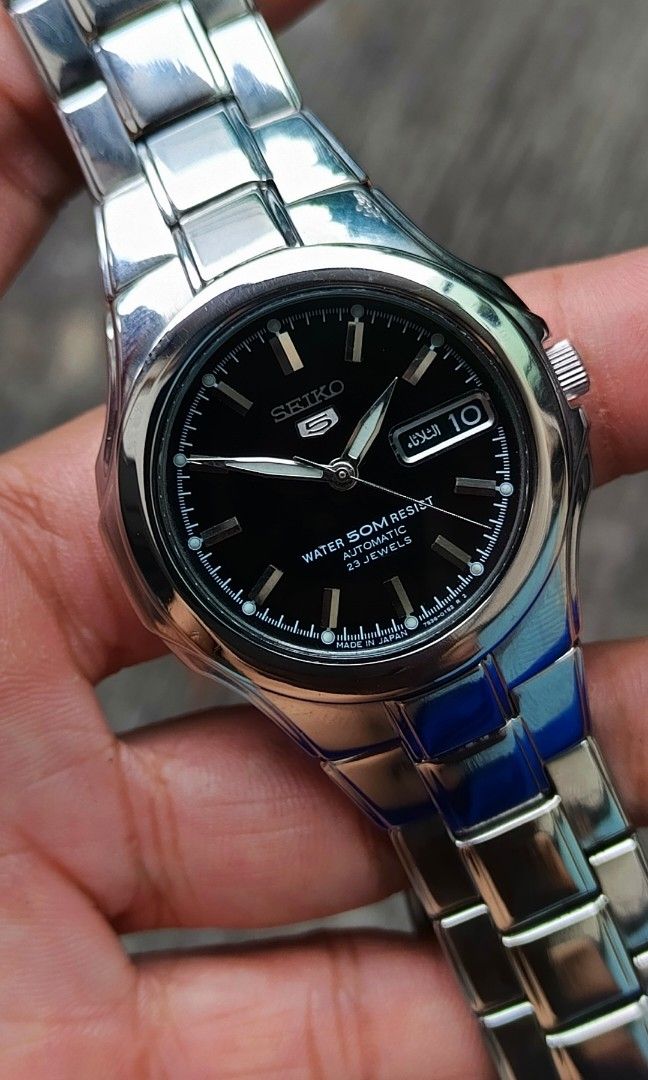 SEIKO 5 "Seikonaut" Discontinued model (Category: Luxury Watches) located in Manila. Submitted by arcads97 (Listing ID 1442942894, Image 2). Description: For Sale: Seiko 5 Automatic Watch (Made in Japan) •ref: 7s36-01R0 •rare/discontinued model/hard to find •nicknamed "seikonaut" • Dial: Black with luminous hands/markers • Movement: Automatic, 23 Jewels • Features: Day-Date display with Arabic/English calendar, 50m water resist • Case & Bracelet:
