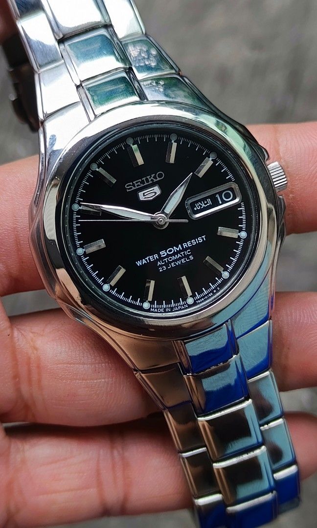 SEIKO 5 "Seikonaut" Discontinued model (Category: Luxury Watches) located in Manila. Submitted by arcads97 (Listing ID 1442942894, Image 1). Description: For Sale: Seiko 5 Automatic Watch (Made in Japan) •ref: 7s36-01R0 •rare/discontinued model/hard to find •nicknamed "seikonaut" • Dial: Black with luminous hands/markers • Movement: Automatic, 23 Jewels • Features: Day-Date display with Arabic/English calendar, 50m water resist • Case & Bracelet: