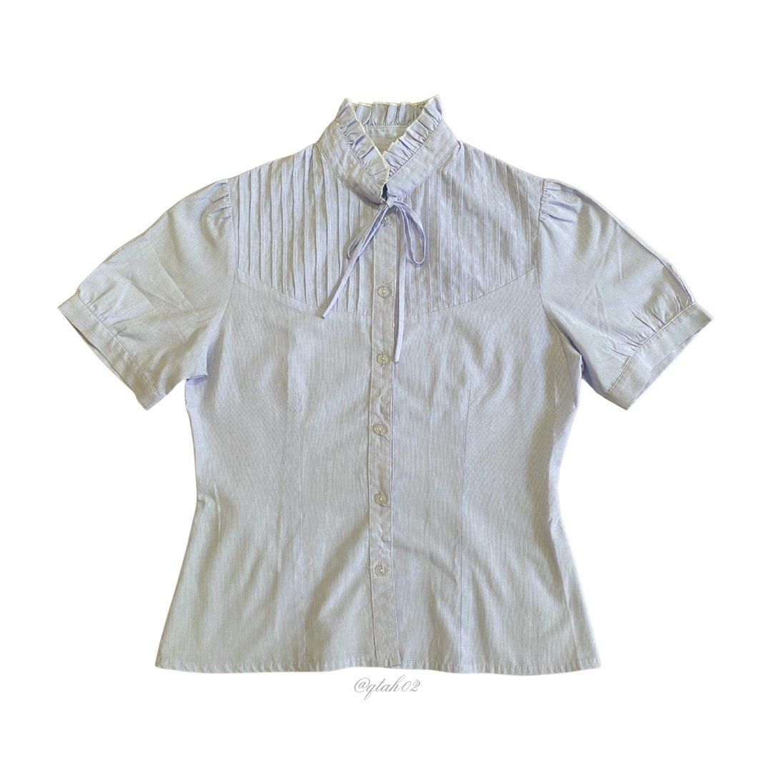 Short Sleeve Ruffled Blouse (Blue Bell Color) (Category: Blouses) located in Marikina City. Submitted by qtah02 (Listing ID 1442944984, Image 1). Description: ⟢ can fit small - medium size ⟢ color of top may vary due to natural lighting ⟢ suitable for summer and light occasions dms are open for inquiries :).