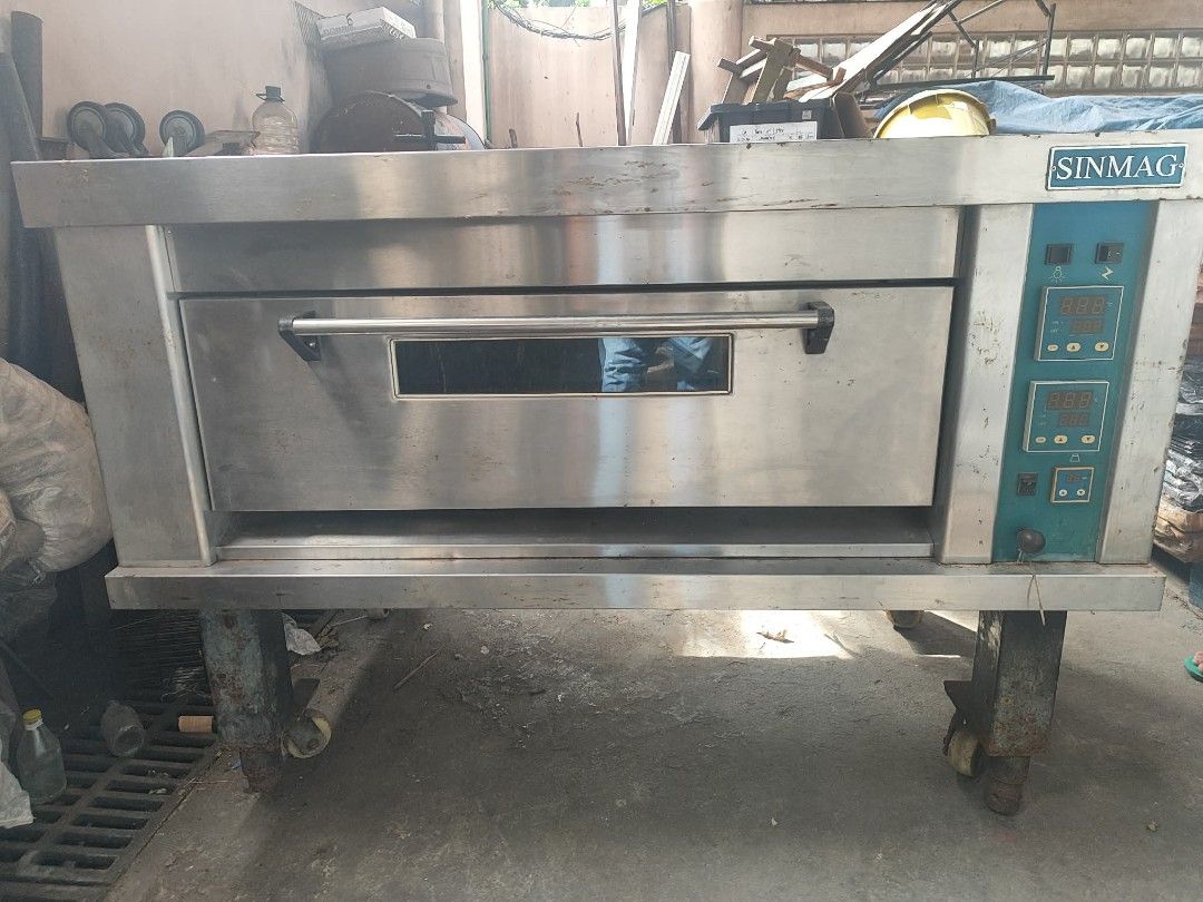 Sinmag gas deck oven (Category: Ovens & Toasters) located in Manila. Submitted by greenshiba (Listing ID 1442994530, Image 1). Description: - Commercial Deck Oven by SINMAG - Durable Stainless Steel Construction - Easy-to-use Digital Temperature Controls - Convenient Door Viewing Window - Built-in Wheels for Mobility - Ideal for Bakeries, Restaurants, and Catering Businesses - Available for Immediate Pickup San Juan.