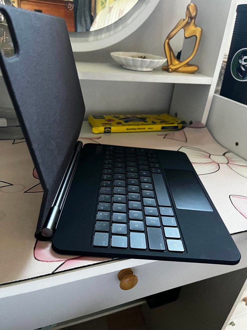 Slim Magnetic Bluetooth Keyboard Case for iPad (Category: Cases & Sleeves) located in Imus. Submitted by drvzocmpz04 (Listing ID 1442926666, Image 2). Description: RUSH!!! Selling this magic keyboard maganda siya. Nagkamali ako ng bili😭 compatible for ipad pro 11 and Air, 11 inch. RFS: di compatible. Price is negotiable😁 - Magnetic keyboard case with built-in trackpad - Backlit keys with adjustable brightness - Easy Bluetooth connectivity.