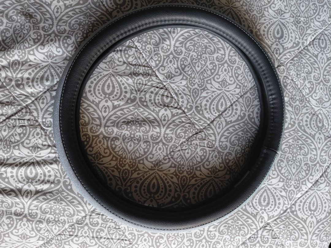 Sparkly Grey Black Steering Wheel Cover (Category: Other Automotive Parts and Accessories) located in Taguig. Submitted by missmisyel (Listing ID 1442940185, Image 3). Description: -Used once. -The item is in excellent condition. - It is a size small (36 cm). -It is a perfect fit for compact SUVs like the Suzuki Jimny, smaller sports cars, or compact hatchbacks (like a Honda Civic, Toyota Wigo, or Suzuki Swift). - Shipping fee not included. Loc: 