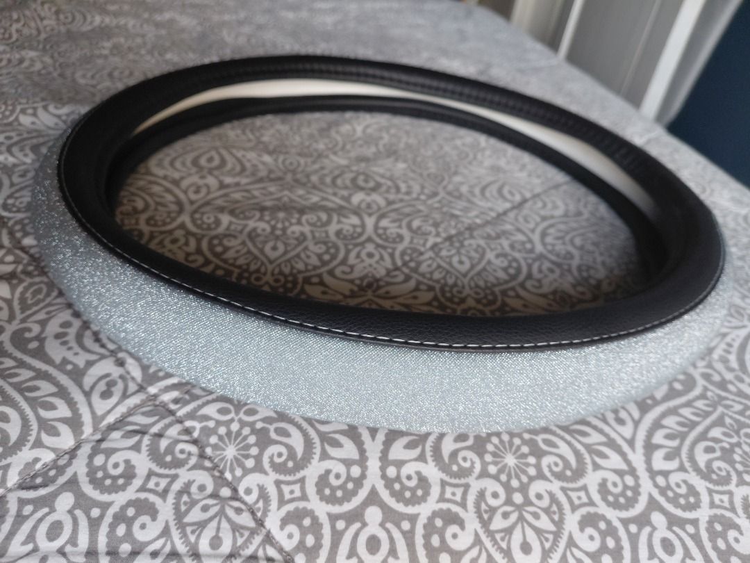 Sparkly Grey Black Steering Wheel Cover (Category: Other Automotive Parts and Accessories) located in Taguig. Submitted by missmisyel (Listing ID 1442940185, Image 2). Description: -Used once. -The item is in excellent condition. - It is a size small (36 cm). -It is a perfect fit for compact SUVs like the Suzuki Jimny, smaller sports cars, or compact hatchbacks (like a Honda Civic, Toyota Wigo, or Suzuki Swift). - Shipping fee not included. Loc: 