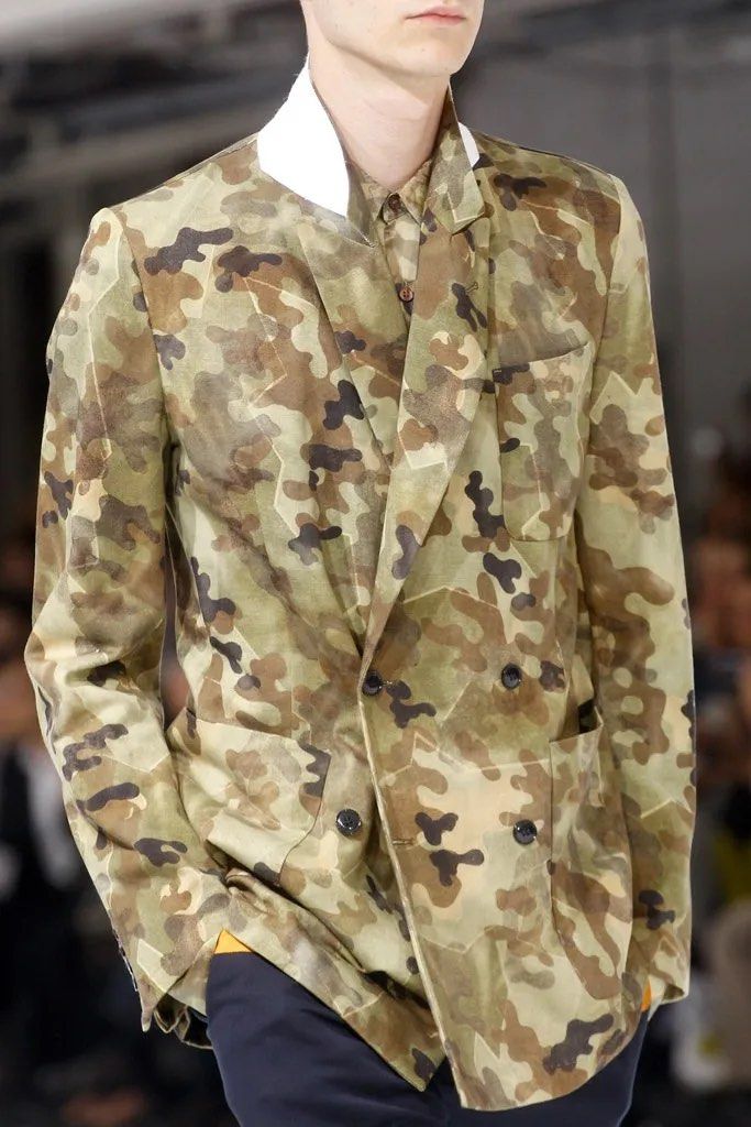SS13 Dries Van Noten Camouflage Blazer (Category: Luxury Apparel) located in Dasmarinas. Submitted by bandananowheree (Listing ID 1442928257, Image 2). Description: Roll with the multi-colored khaki camouflage jacket. This cotton twill jacket features four-button cuffs, two flap pockets on the hips, a chest pocket, and is fully lined. Camouflage may be meant to hide you from your opponent, but with this jacket, it’s the exact opposite. Stand out 