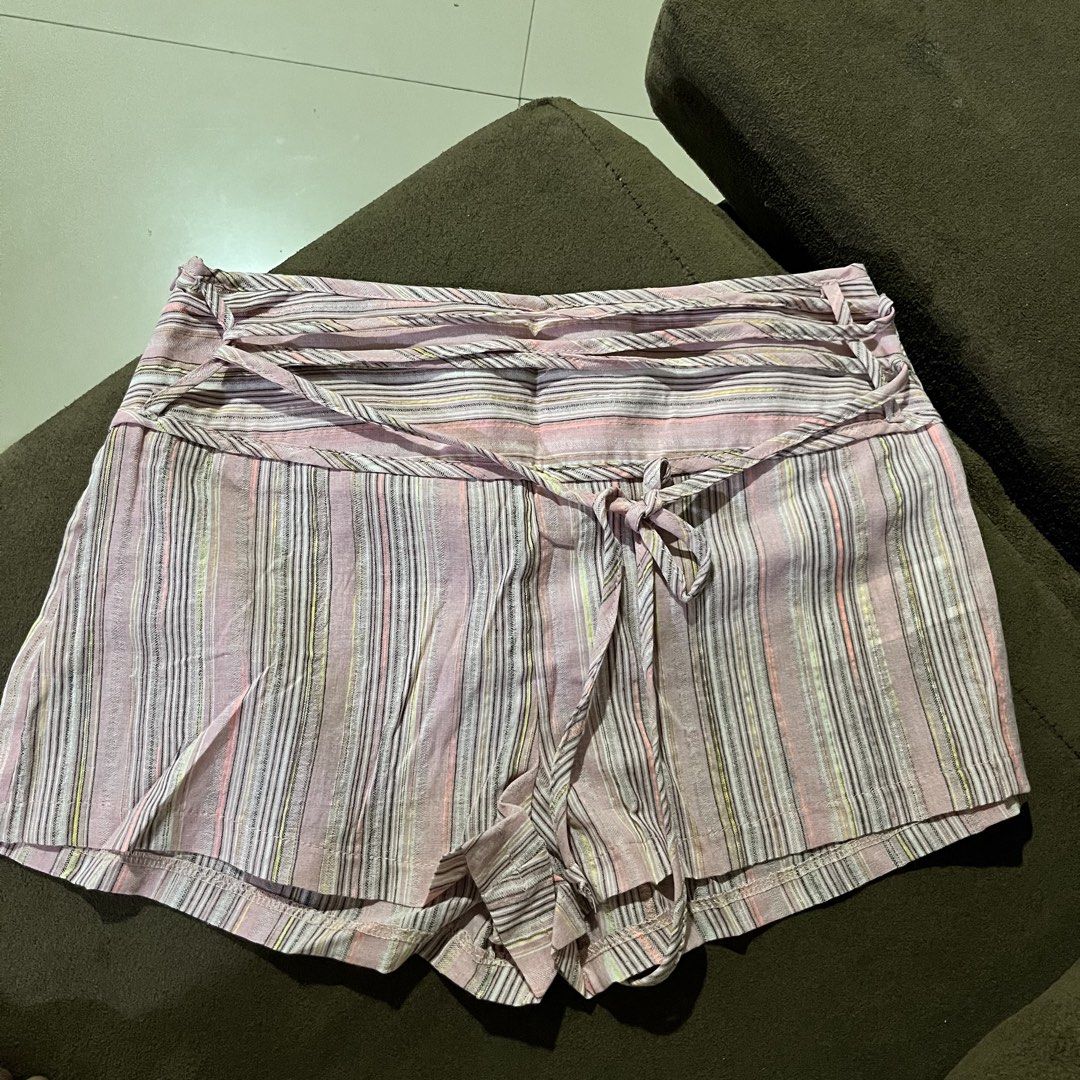 Striped Shorts with Tie Waist (Category: Shorts) located in Manila. Submitted by theiftee (Listing ID 1443039362, Image 1). Description: -size : 28 inches waist - Cute pink striped design - High-waisted fit - Trendy tie-front detail - Lightweight fabric, ideal for hot weather - Convenient side zipper closure - Versatile for casual outings or beach days.