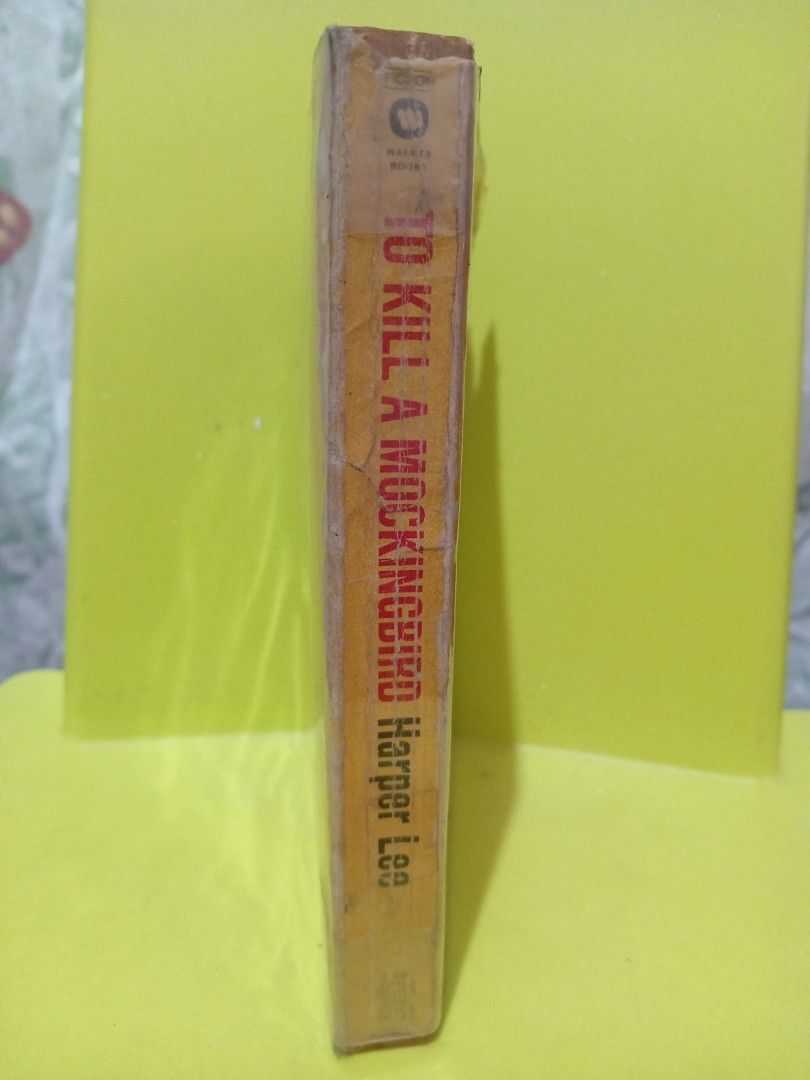 ©1960 To Kill A Mockingbird by Harper Lee (Category: Storybooks) located in Mabalacat. Submitted by kencloset (Listing ID 1443014302, Image 3). Description: Paperback ©1960 Yellowed pages due to age. No tears. No writings. With plastic cover Harper Lee's Pulitzer-winning 1960 novel To Kill a Mockingbird is narrated by young Jean Louise "Scout" Finch in 1930s Maycomb, Alabama. The story tracks her father, Atticus, a principled lawyer defending a B