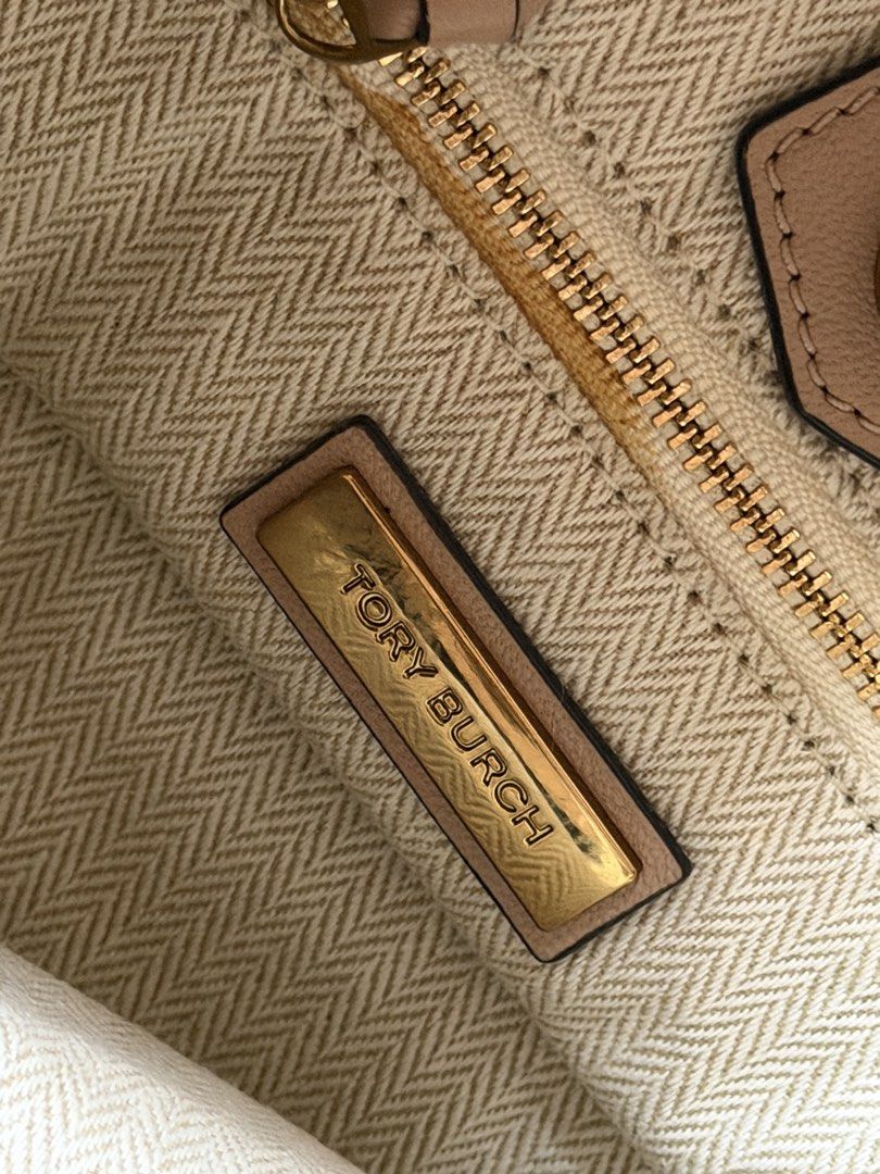 Tory Burch Kira Chevron Bucket Bag (Category: Cross-body Bags) located in Manila. Submitted by pinkkitkat (Listing ID 1442996419, Image 2). Description: 💗 Authentic Tory Burch Kira Bucket Bag in gorgeous Pink Nude shade ✨ Elegant and timeless design, perfect for everyday use or dressy occasions ✨ Spacious interior with adjustable strap ✨ Easy to match with any outfit, from casual to chic 📍in good condition(see last 2 photos for minimal flaws) �