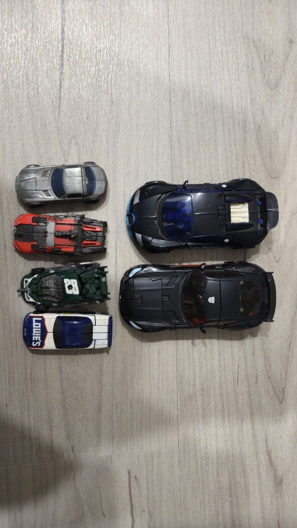Transformers bundle (Category: Toy Figures) located in Singapore. Submitted by ec_collectibles (Listing ID 1443048262, Image 2). Description: Set consists of: - SS102 ROTB Optimus prime (with modified smokestacks) - Age of extinction drift (painted black) - The last knight drift - DOTM Legend class Wreckers - DOTM Legend class sound wave - All displayed, Loose - No nego Paynow accepted.