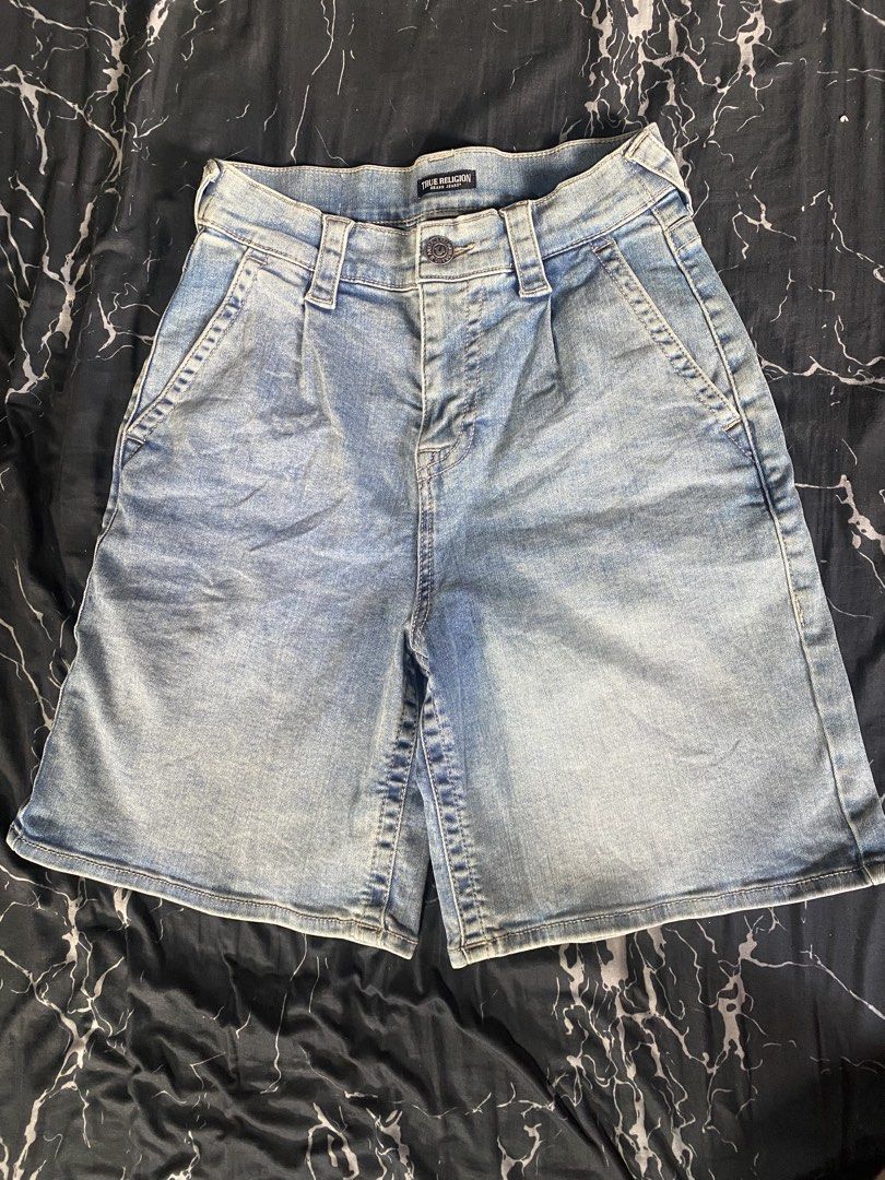 True Religion Brand Jeans Denim Shorts (Category: Shorts) located in San Pedro. Submitted by raprap.monte (Listing ID 1442960920, Image 1). Description: - Brand: True Religion - Style: Light wash denim shorts - Features: Classic five-pocket styling, button and zip fly closure - Fit: Knee-length inseam, comfortable for casual wear.