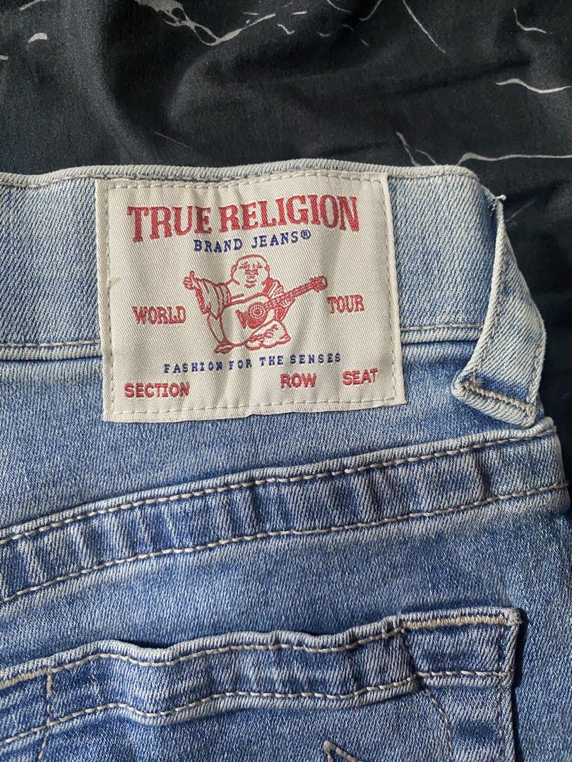 True Religion Brand Jeans Denim Shorts (Category: Shorts) located in San Pedro. Submitted by raprap.monte (Listing ID 1442960920, Image 3). Description: - Brand: True Religion - Style: Light wash denim shorts - Features: Classic five-pocket styling, button and zip fly closure - Fit: Knee-length inseam, comfortable for casual wear.