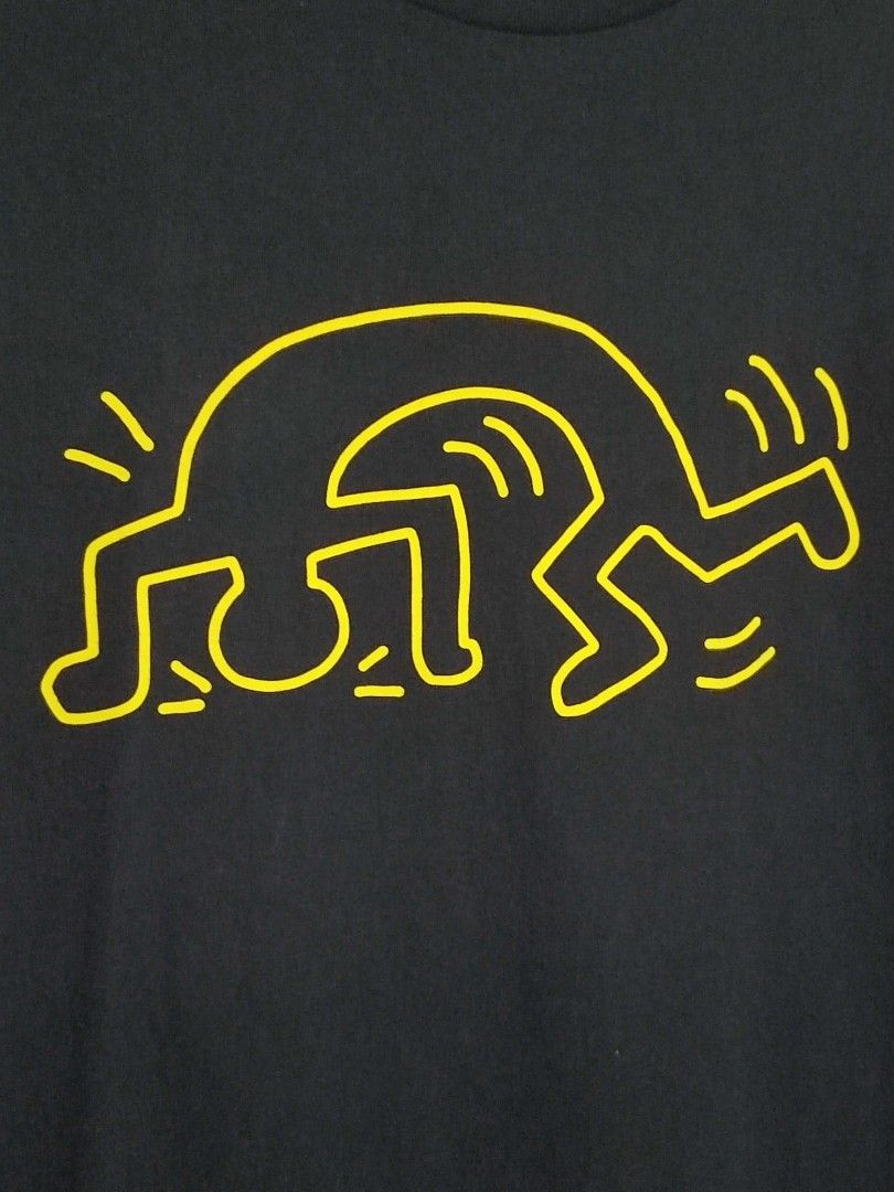 Uniqlo Keith Haring shirt (Category: Tshirts & Polo Shirts ) located in Quezon City. Submitted by schorer (Listing ID 1443066625, Image 2). Description: - Uniqlo UT T-shirt - Color: Black - Graphic: Iconic Keith Haring yellow design - Size: Large 21x28 - Material: 100% Cotton - Style: Comfortable and stylish for everyday wear - Ideal for: Fans of Keith Haring's art.