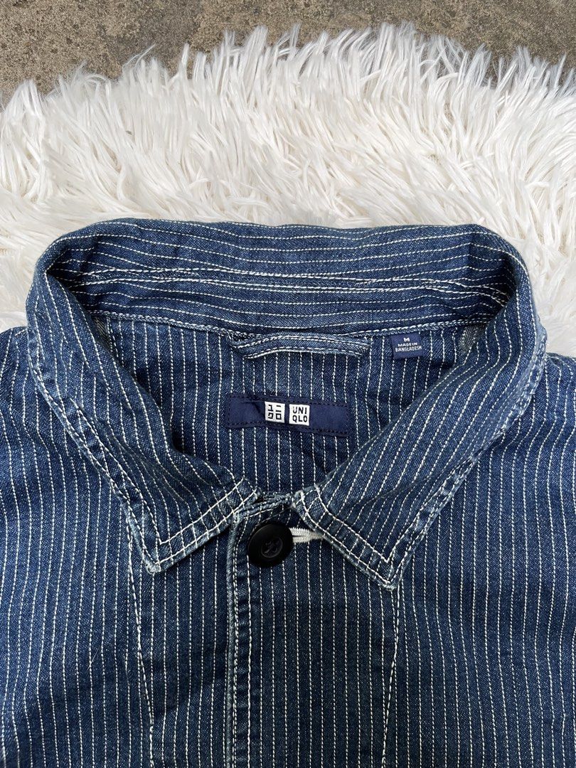 UNIQLO Striped Chore Jacket Indigo Blue (Category: Coats, Jackets and Outerwear) located in Davao. Submitted by streetsight (Listing ID 1442967417, Image 2). Description: - Uniqlo Indigo Blue Chore Jacket - Classic pinstripe pattern - Button-up front closure - Two chest pockets - Two side pockets - Versatile workwear style, ideal for layering.