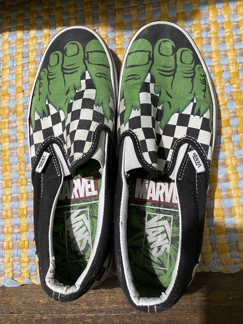 Vans x Marvel Classic Slip-On sneakers (Category: Sneakers) located in Makati City. Submitted by lasthing.22 (Listing ID 1443059561, Image 1). Description: These Vans x Marvel Classic Slip-On sneakers feature a vibrant green Hulk fist graphic printed over the signature black and white checkerboard pattern. RFS: Naka stock Location: Makati City MOP: Gcash MOD: J&T/Lalamove.