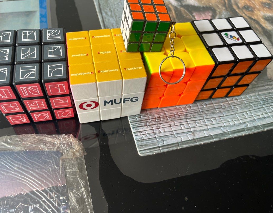 Rubik's Cubes (Category: Board Games & Puzzles) located in Singapore. Submitted by epiceagle-6922 (Listing ID 1442978310, Image 1). Description: rubiks cube all for $18 official rubiks brand cube $6 standard 3x3 cube $3 mini cube keychain $1 megaminx $10 the rest free.