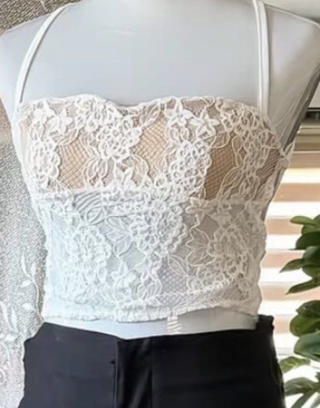 Free People White Lace Top (Category: Others Tops) located in Marikina City. Submitted by mlffy (Listing ID 1442996564, Image 2). Description: 🐰 White Lace Tie Top - Features a nude lining underneath the lace - Thin adjustable straps - Pairs well with high-waisted pants or skirts - Ideal for night outs or special occasions.