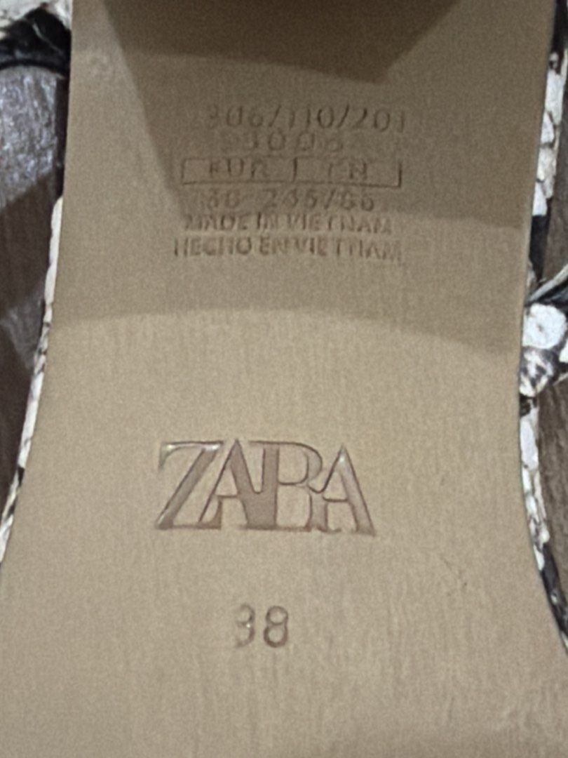 Zara Snake Print Block Heel Sandals (Category: Flats & Sandals) located in Manila. Submitted by airaaaaaamae12 (Listing ID 1442967856, Image 2). Description: - Zara sandals - Cool snake print design - Comfortable block heel - Stylish strappy silhouette - Size: 38 EUR - Perfect for dressing up or down.