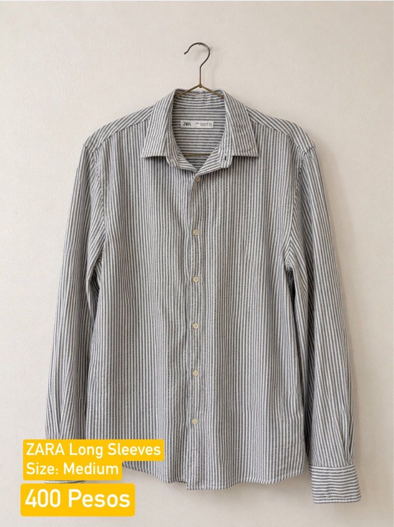 ZARA Striped Long Sleeves Shirt - Size Medium (Category: Longsleeves) located in Manila. Submitted by emmanuelosit (Listing ID 1443042929, Image 1). Description: Declutter Sale from my wardrobe - ZARA Long Sleeves Shirt - Classic Grey & White Pinstripe Pattern - Size: Medium - Button-up Front - Versatile for Casual or Smart-Casual Wear.