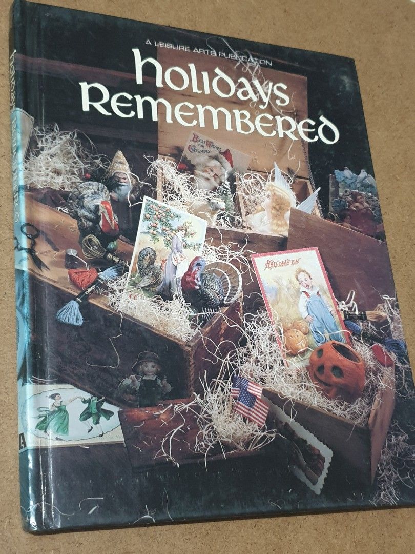 1993 Cross-Stitch Pattern Hardbound Book - Holidays Remembered (Category: Handmade Craft) located in Las Pinas. Submitted by oldsthetics (Listing ID 1443193588, Image 1). Description: 1993 Cross-Stitch Pattern Hardbound Book - Holidays Remembered Published by Leisure Arts Arkansas, USA A hardcover publication features over 54 counted cross-stitch patterns for various holidays This book features vintage-style artwork and photograph-like cross-stit