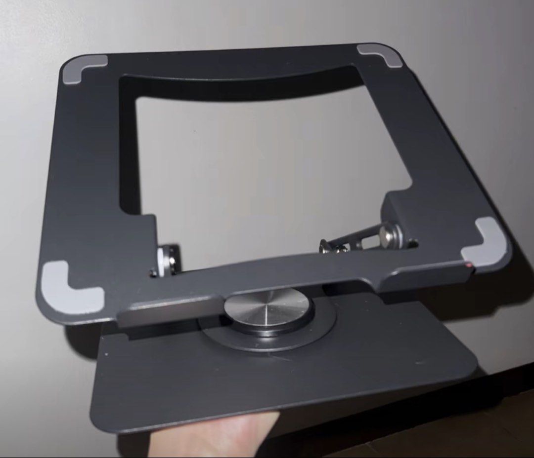 360 Rotating Adjustable Laptop Stand for 10-17 inch Laptops (Category: Laptop Bags & Sleeves) located in Quezon City. Submitted by jmdguzman0330 (Listing ID 1443192243, Image 3). Description: - Adjustable laptop stand with 360° rotation - Fits laptops from 10 to 17 inches - Made of durable aluminum alloy - Enhances ergonomics and laptop airflow - Folds flat for easy portability - Ideal for home and office use Qty: 1 Stocks: 2 Color: Black.