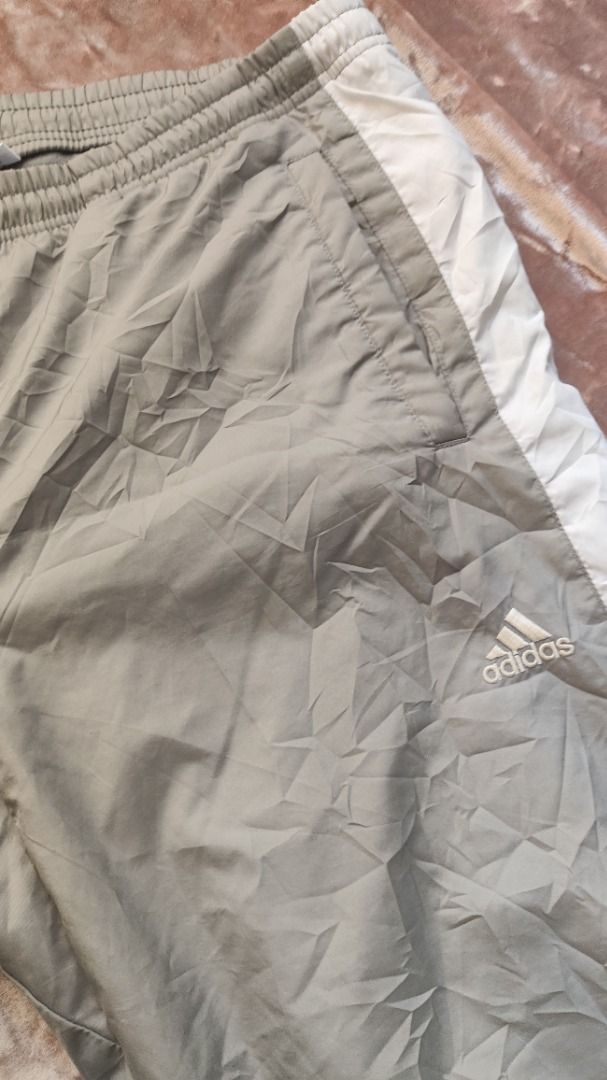 Adidas Track Pants (Category: Other Bottoms) located in Makati City. Submitted by declutterwithcath (Listing ID 1443187663, Image 1). Description: Adidas Gray track pants 28-32 in waist.
