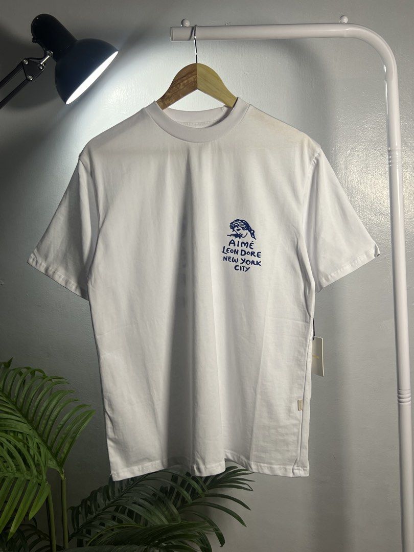 Aime Leon Dore Goddess Tee (Category: Tshirts & Polo Shirts ) located in Las Pinas. Submitted by thriftstax (Listing ID 1443294446, Image 1). Description: Excellent pristine condition with hang tags medium on tag 22x27.