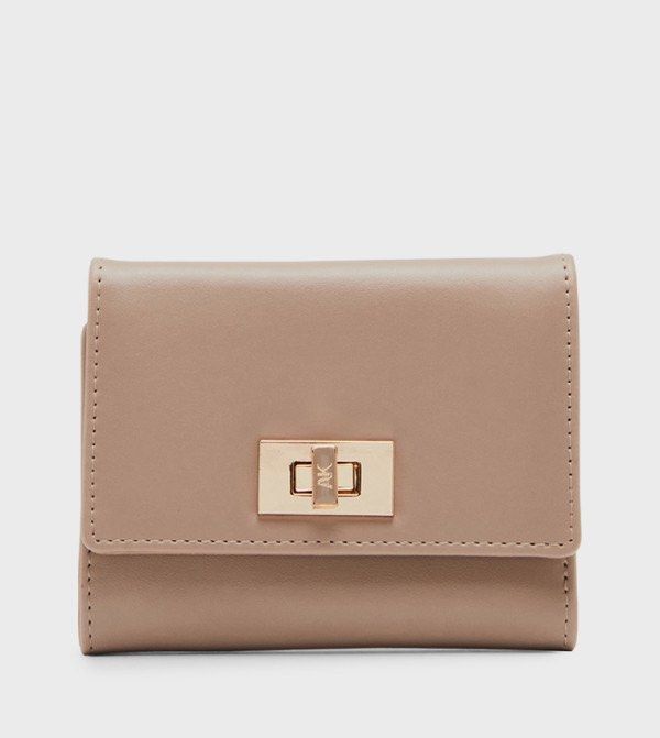 AK Anne Klein Tri-Fold Wallet (Category: Wallets & Card holders) located in Dumaguete. Submitted by deklutterfly (Listing ID 1443182958, Image 2). Description: Decluttering 🛍️ Everything must go 💖 AK Anne Klein Tri-Fold Wallet - Tri-fold wallet in a versatile beige/tan color - Bought from Zalora at Php 2k+ - Elegant gold-tone hardware with a secure twist-lock closure - Practical interior with multiple card slots and a zippered pocket for coins,