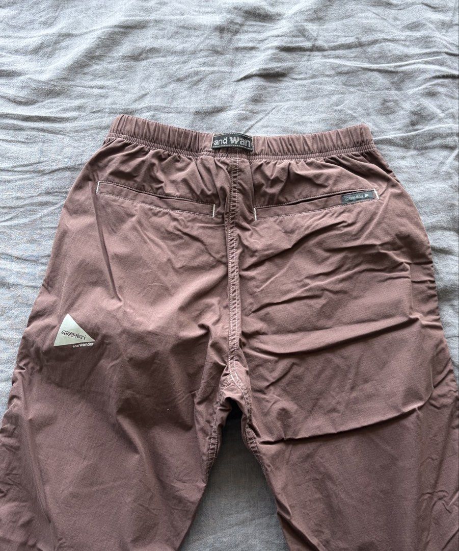 and wander x Gramicci climbing Pants (Category: Trousers) located in Taguig. Submitted by goodoldfashionedvalues (Listing ID 1443169582, Image 3). Description: and wander x Gramicci climbing pants Ripstop texture fabric but it’s soft to the touch because it’s cotton-poly blend. With built in belt Original price around 12k Purchased in April from commonwealth GB. Only used once. Bordeaux colorway - neutral dark brown.