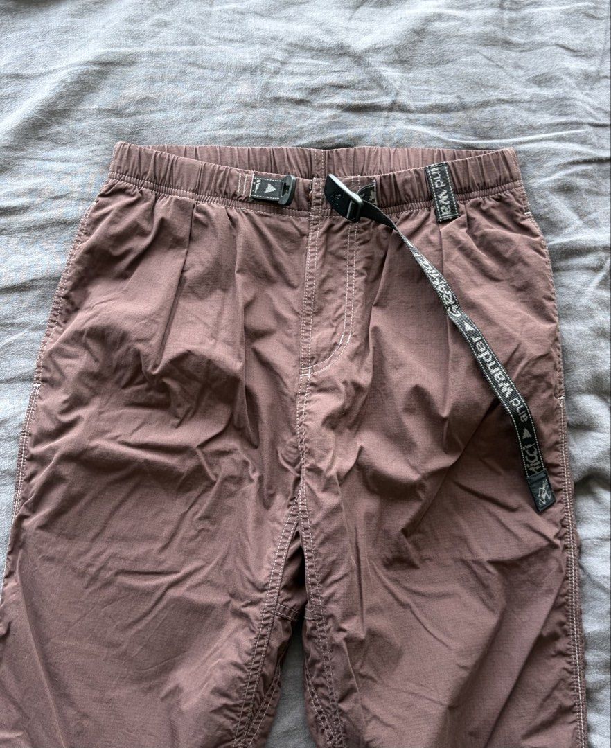 and wander x Gramicci climbing Pants (Category: Trousers) located in Taguig. Submitted by goodoldfashionedvalues (Listing ID 1443169582, Image 2). Description: and wander x Gramicci climbing pants Ripstop texture fabric but it’s soft to the touch because it’s cotton-poly blend. With built in belt Original price around 12k Purchased in April from commonwealth GB. Only used once. Bordeaux colorway - neutral dark brown.