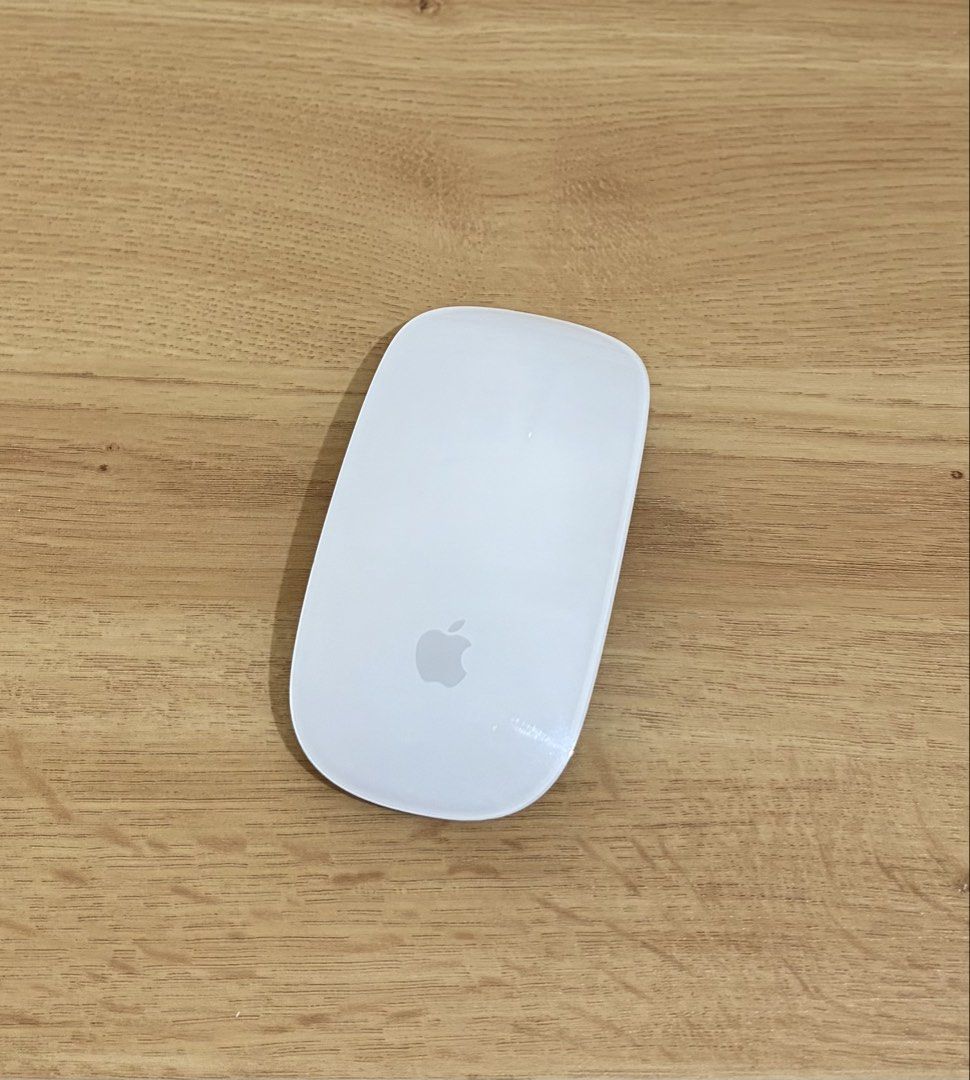 Authentic Apple Magic Mouse White (Lightning port) (Category: Mouse & Mousepads) located in Pasig City. Submitted by curlize (Listing ID 1443314091, Image 1). Description: Apple Magic Mouse (lightning cable) - No USB cable included, only includes Mouse - Well used, still working perfectly. No damage, just have some wear and tear lines/dots, see pictures . - RFS: Decluttering.